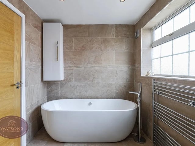 The luxury family bathroom is the perfect place to relax and unwind after a busy day.