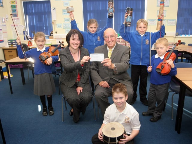 Donation to Kirkstead school from West Ashfield Rotary club. L-R Kelsey Sharman,Leah Coster (head), Leah Clegg,Mike Lee (Rotary), Jordon Hemsley, Javen Twelves, front Kia Ellis-Brown.
