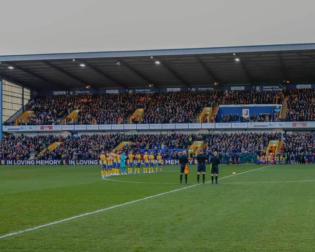 Players, officials and fans remember all those connected to the club who passed away in 2023 prior to the match against Crewe Alexandra on Saturday. Photo by Chris & Jeanette Holloway / The Bigger Picture.media