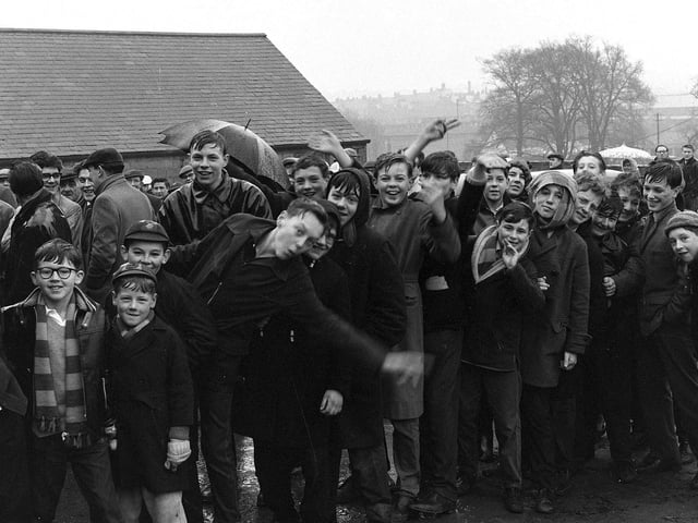 These lads queue with their mates in 1962 to get tickets to the big game.
