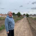 Roy Butler, a resident and parish councillor from Warsop, is 'heartbroken' by the decimated hedgerow.