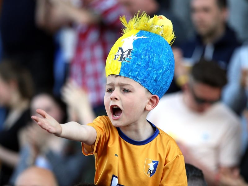 A youngster enjoys a Stags v Morecambe game.