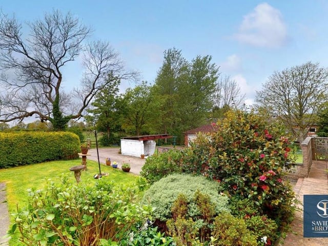 This view from the front door underlines the beauty of the garden at a property that is set well back from Nottingham Road on a plot of land stretching to 0.37 of an acre.