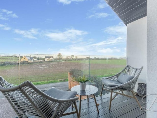 This is the unmissable countryside view from the garage extension balcony.