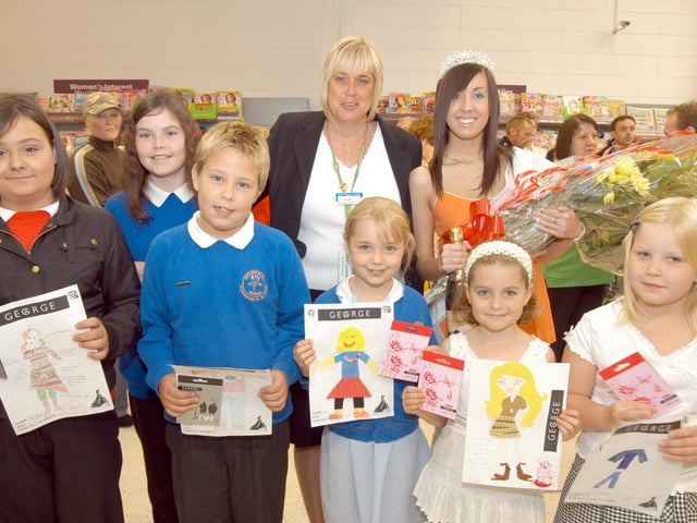 Miss Mansfield and Sherwood Forest, Kate Osborn, back left, pictured with staff and prizewinners at the opening of the refurbished top floor of Asda in 2007