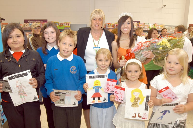 Miss Mansfield and Sherwood Forest, Kate Osborn, back left, pictured with staff and prizewinners at the opening of the refurbished top floor of Asda in 2007