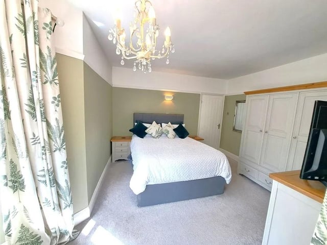 One of four well-proportioned bedrooms.