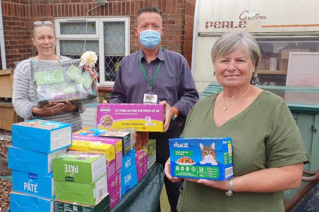 Helping  hedgehogs by collecting cat food donations - l-r Cheryl Martins of the Mansfield Wildlife Rescue Centre, Cllr John Coxhead and Anne Callaghan
