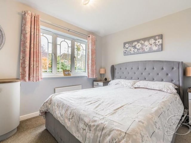 Of the four bedrooms on the first floor, the master is the largest. Overlooking the rear garden, it has the added luxury of a built-in wardrobe area and its own private en suite shower room.