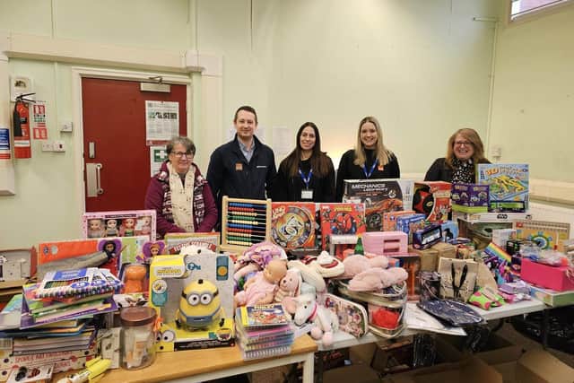 Volunteers accepted gifts and toys have been donated by employees at Wincanton B&Q Worksop Distribution Centre.