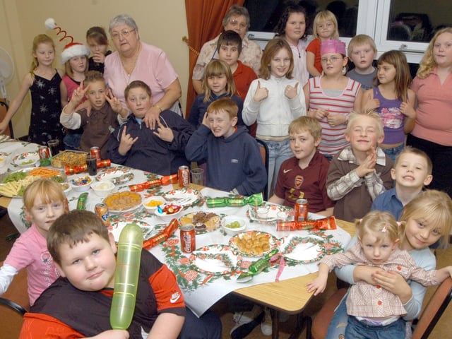 Sutton Helpers and youngsters pictured at the final Christmas Party held by the Willetts Court Residents Association Youth Group in 2006.