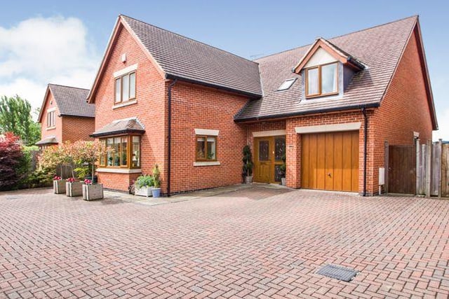 This four bedroom house has far reaching views, four reception rooms and is in a gated cul-de-sac. Marketed by Housesimple, 0113 482 9379.
