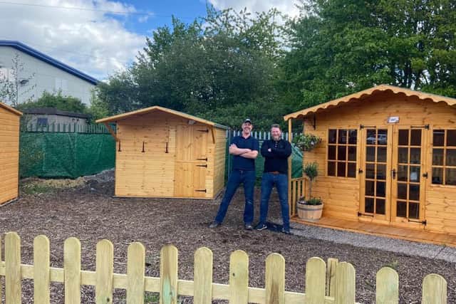 Neil and Phil Ashmore of The Shed Brothers have donated a shed to one of the allotment owners.