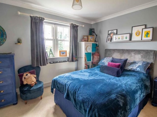 This is another spacious double bedroom, sitting at the rear of the £500,000 house. It is next to the family bathroom.