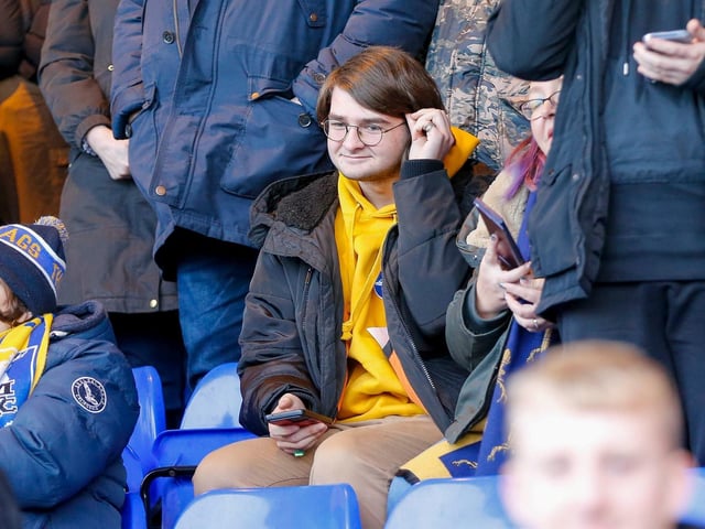 Mansfield Town fans enjoy the win at Stockport County.