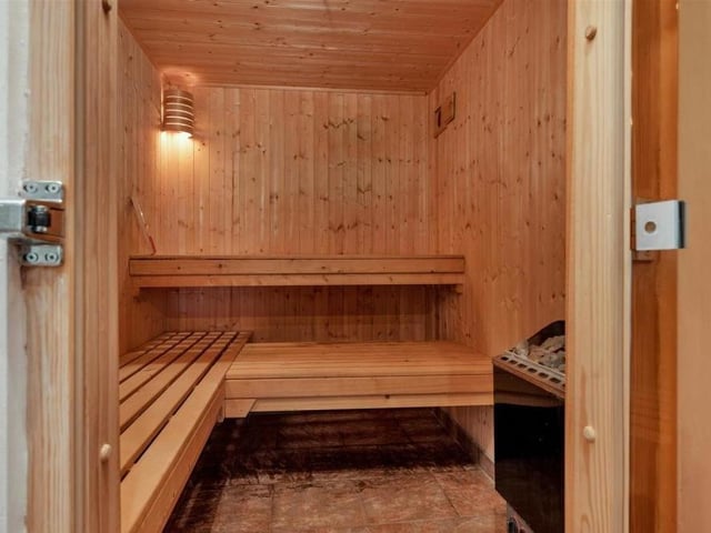 Not many properties in Mansfield can offer a sauna and a steam room. This one can. Both spaces have seating and a tiled floor.