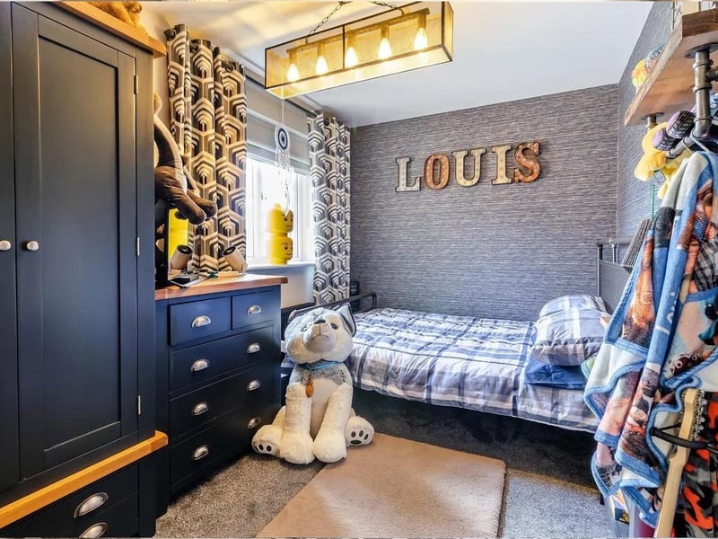 The property boasts four bedrooms, perfect for a family.