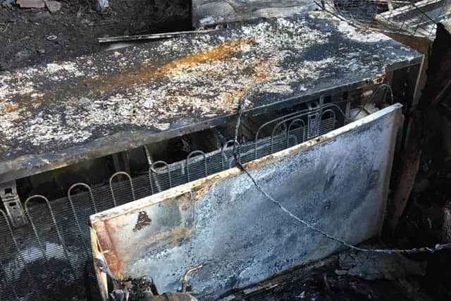 One of the many burned out fridges on Deerdale Lane