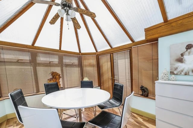 The lounge leads through to a high-quality conservatory, which can also be used as a dining room.  It has laminate flooring, uPVC double-glazed windows and French doors leading out to the garden.
