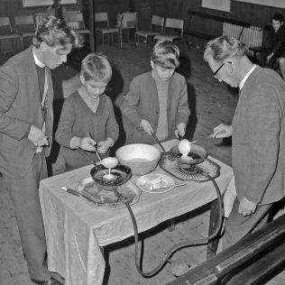 Photo of a pancake making competition in February 1970 at the Methodist church on Chesterfield Road South, Mansfield.