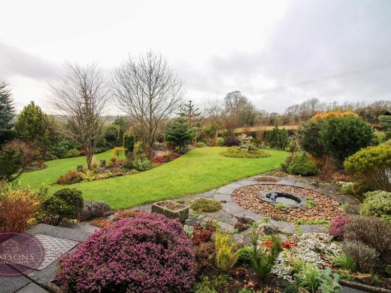 Here is the first of several shots of the delightful garden at the back of the Nottingham Road property. A well-maintained lawn blends well with a range of mature plants and shrubs, and also flowerbed borders.
