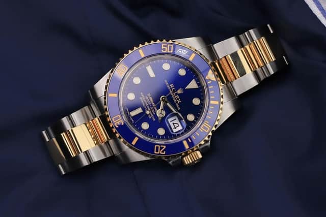 A victim was conned into buying an expensive Rolex watch