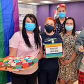 Manager Keelan Trench (back) with staff members Louisa Pearce, Megan Aitken and Daniella Mayes at a fundraising day at a Supercuts salon in Mansfield to support the LGBT+Service Nottinghamshire charity as part of Pride Month. Also pictured are Georgia Crossland and Noah Phoenix from the charity.