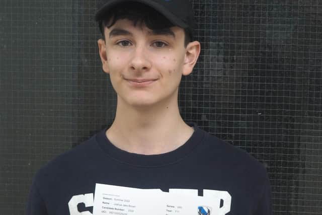 Hall Park Academy student Joshua Brown with his results.