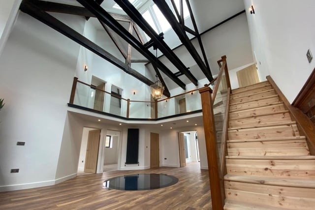 As soon as you walk through the door, you get a sense of openness and light. The central atrium, complete with its characterful staircase, is an impressive way to introduce the property.