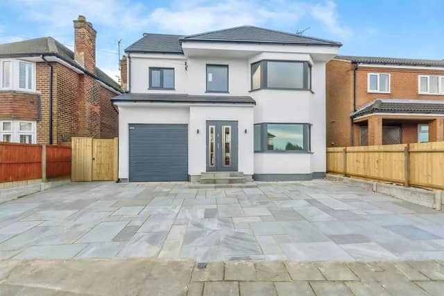 This beautifully renovated six-bedroom detached home offers modern luxury in a sought-after location.