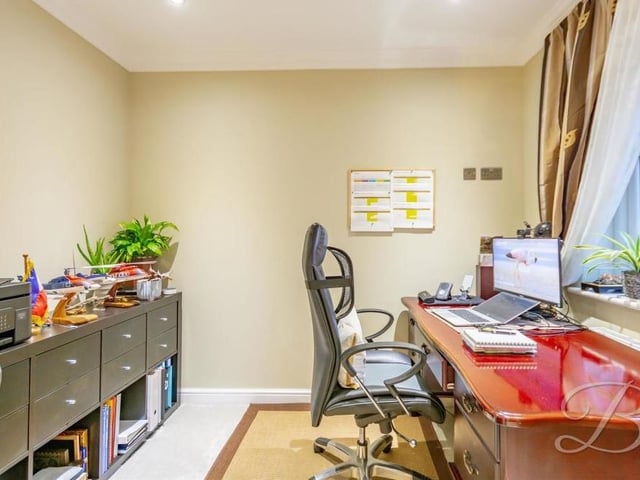 This room is currently being used as a home office. But it is a versatile space that could easily be converted into a bedroom, study or playroom.