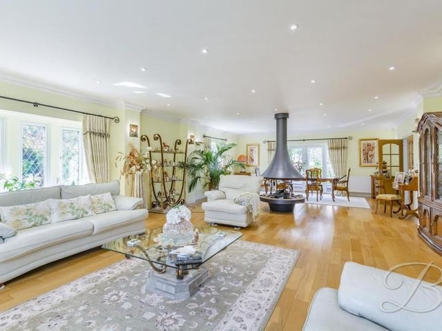One of the most striking features of the Ravenshead house is this Bordelet feature fireplace, with log-effect gas fire, which sits in the centre of the spacious living room and provides a stunning focal point. The room also has four central heating radiators.