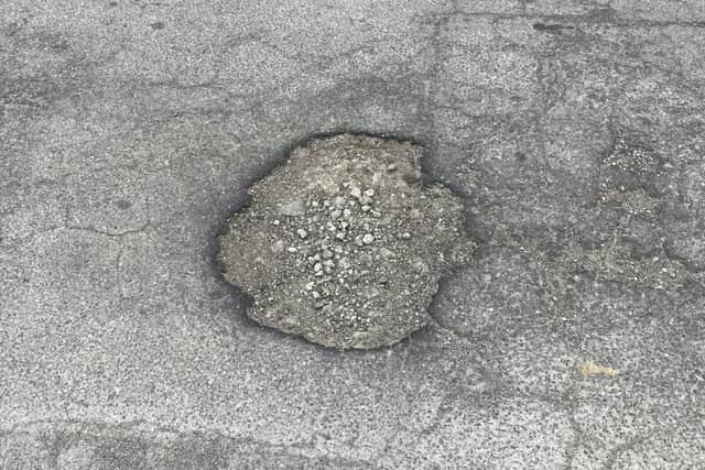 one of the first pot holes I reported 