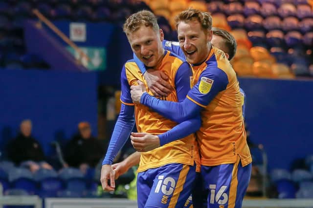 George Maris celebrates his goal with Stephen Quinn. Photo credit - Chris Holloway / The Bigger Picture.media