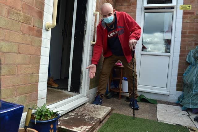 Desperate tenant Harry Smith outside the front door of his Mansfield home where he had his fall.