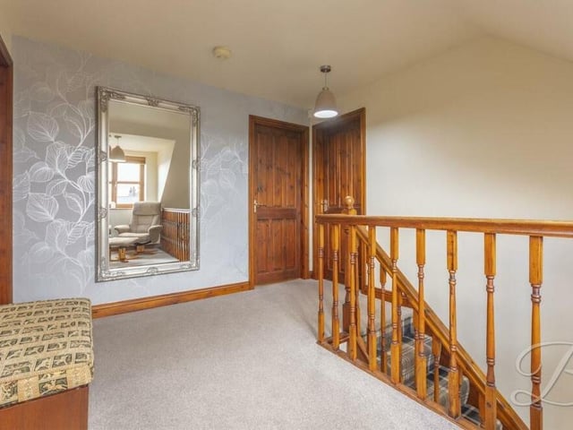 At the top of the stairs, we are greeted by this attractive first-floor landing, which leads to the other two bedrooms and a family bathroom.