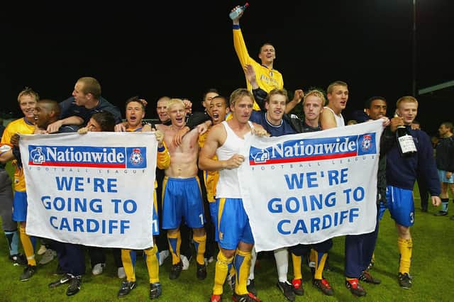 Mansfield celebrate after the penalty shoot out against Northampton.