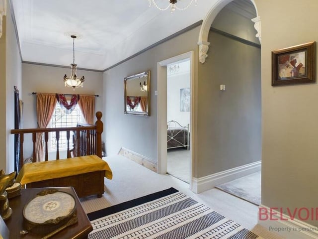 Time to go upstairs at Rydal House now to check out the five bedrooms. We are greeted by a spacious, half-galleried landing with stained glass leaded windows, feature archways and two chandeliers.