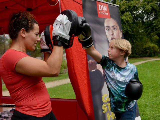 Lilly Steudel, nine having a go at boxing with DW Fitness at Mansfield Summer Festival at Titchfield Park