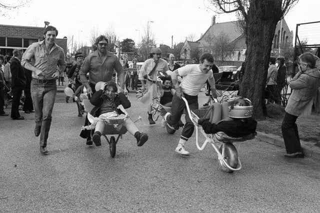 The wheelbarrow race through Forest Town was a popular occasion.