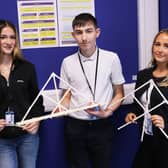 T Level Survey and Design students Emily Coupe, Ciprian Calimanus and Lily Litchfield were tasked to build a bridge from bamboo slats, to withstand a small weight. Photo: Submitted