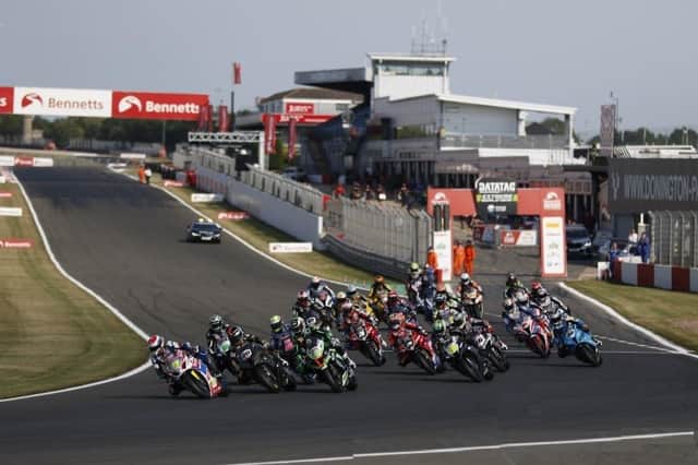 Kyle Ryde leading the pack through turn one at Redgate Corner at the start of race one. (Photograph courtesy of Double Red)