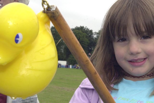 Four-year-old Emily Brooks from Wadsley Bridge, hooks a duck for 20p in aid of the Sutton residents association at the Hillsborough Gala