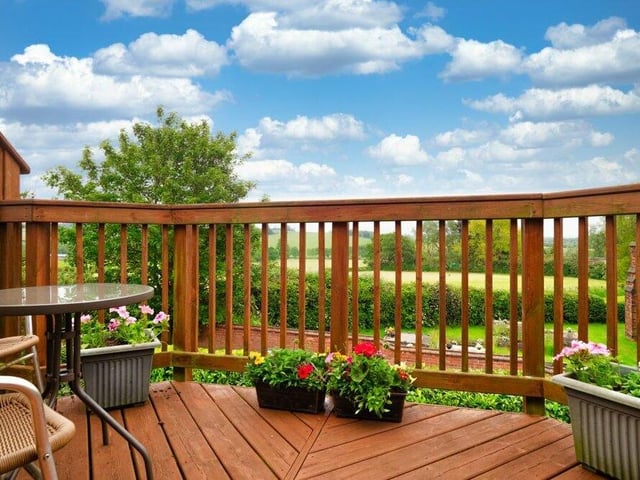 Here is the balcony of the master bedroom, offering a relaxing place to sit and marvel at breathtaking countryside views.