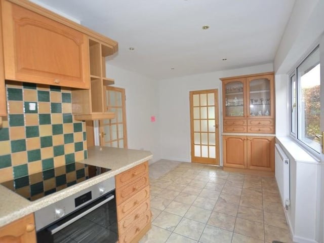 The breakfast kitchen offers space and style in equal measure. It features a range of fitted wall and floor units with roll-edge work surfaces, and an inset stainless steel drainer sink with mixer tap.