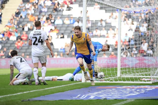 Elliott Hewitt levels during the Sky Bet League 2 match against MK Dons at Stadium MK, 13 April 2024 Photo credit Chris & Jeanette Holloway / The Bigger Picture.media