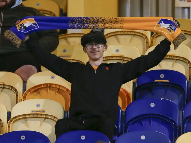 Mansfield Town fans watching the draw with Wrexham.
