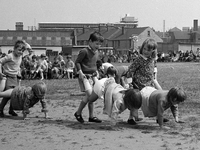 These Mansfield pupils take on the wheelbarrow race in 1970.