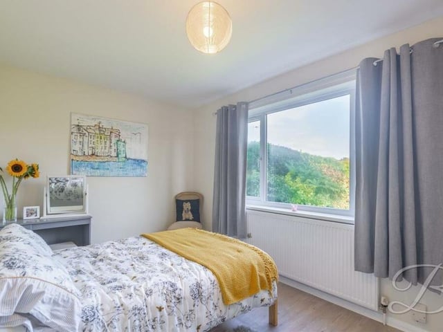 Bedroom number three at the £325,000-plus bungalow overlooks the back garden and beyond.