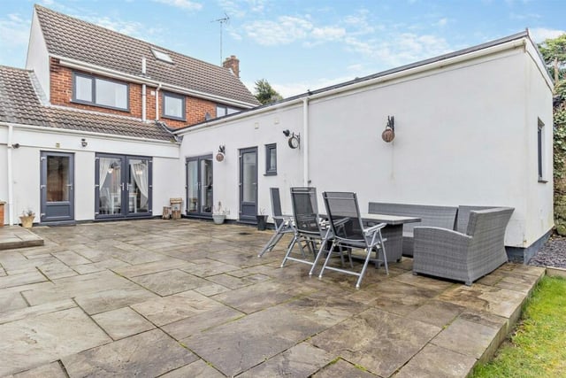 As well as the lawn, the back garden features a large patio with space for a pleasant seating area.